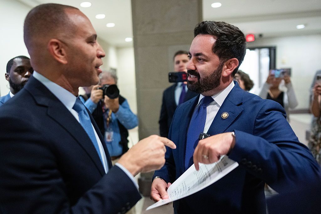 Rep. Mike Lawler (right), R-N.Y., confronts House Minority Leader Hakeem Jeffries, D-N.Y., about signing on to a bill that would extend Affordable Care Act tax credits, on Oct. 8.